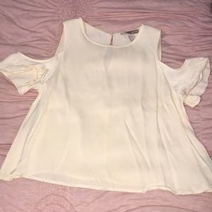 a silk cream colored blouse